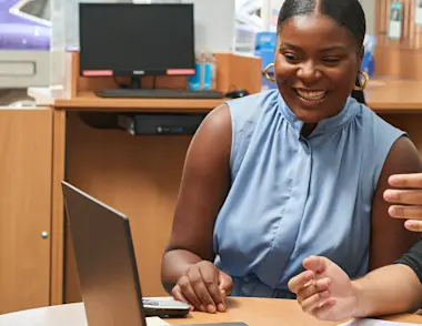 Explore Learning manager at a laptop