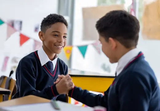 Image of two students at a grammar school