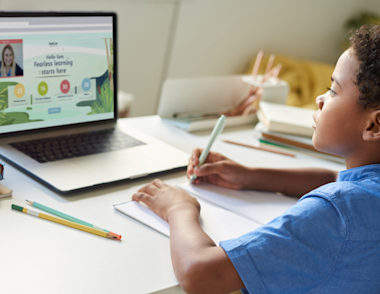 Boy learning at home on Compass home screen