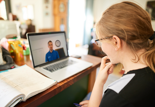 Girl taking an online maths and English tuition session with an Explore Learning tutor.