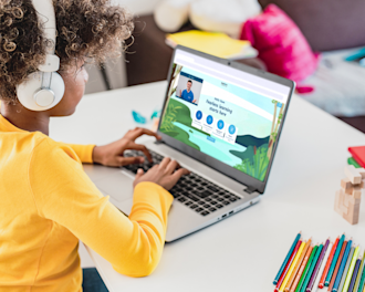 Girl practising her Explore Learning online tuition